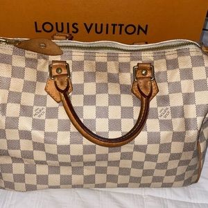 Fashioned from luminous Damier Azur canvas, the Speedy 30